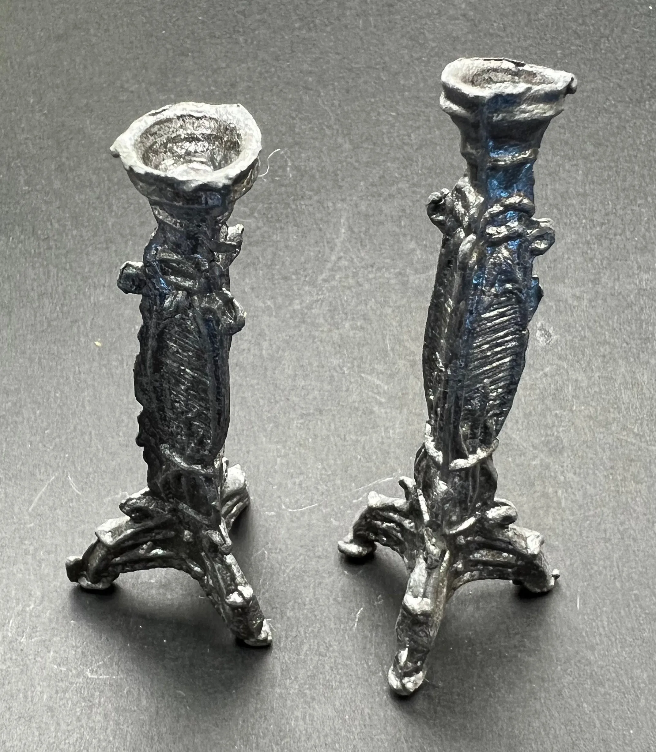 A Pair of Mysterious Small Candlesticks