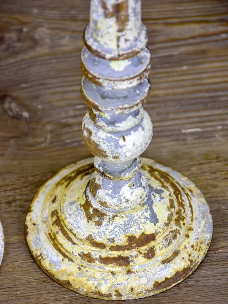 Collection of four rustic vintage candlesticks