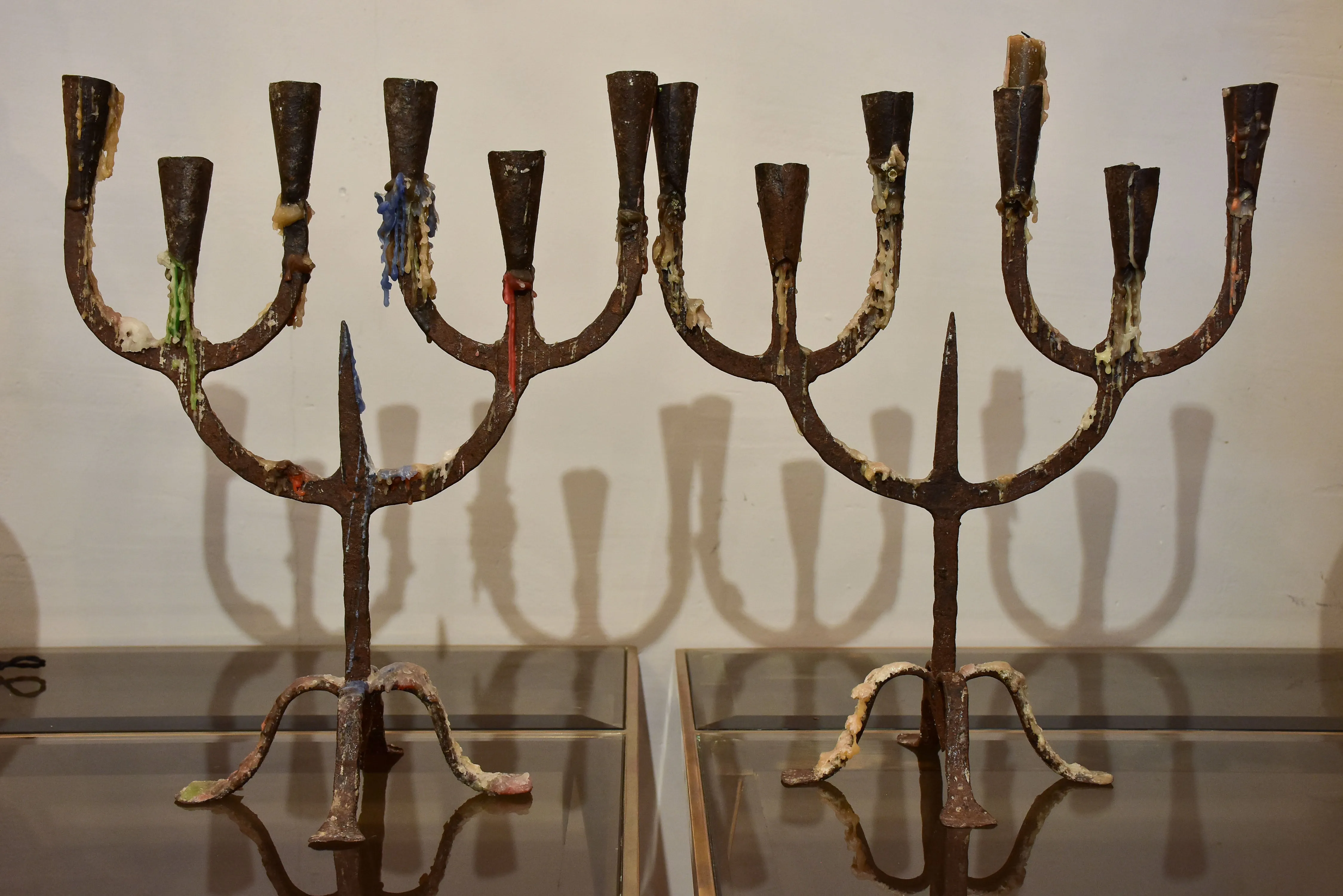 Pair of antique wrought iron candelabras