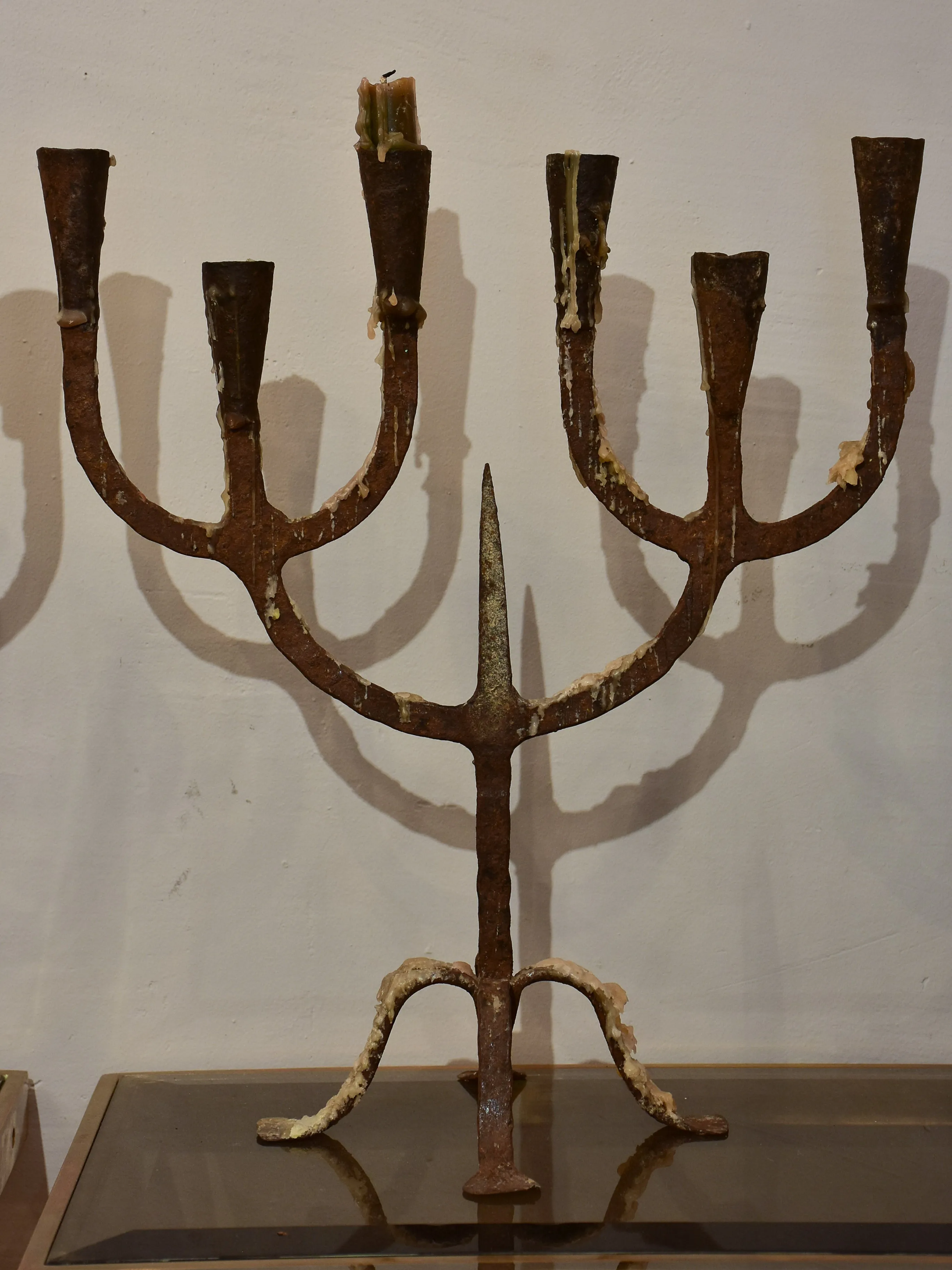 Pair of antique wrought iron candelabras