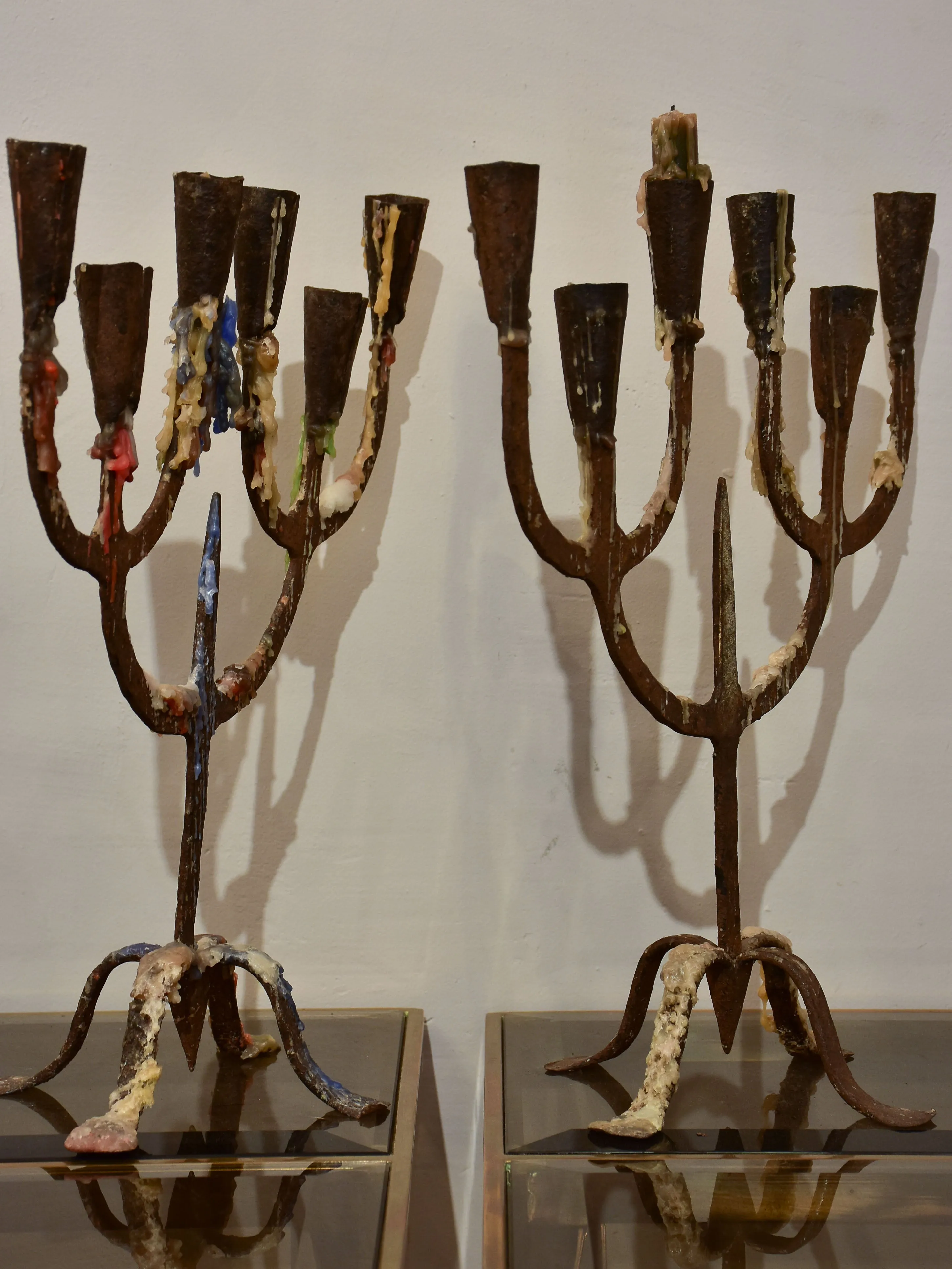 Pair of antique wrought iron candelabras