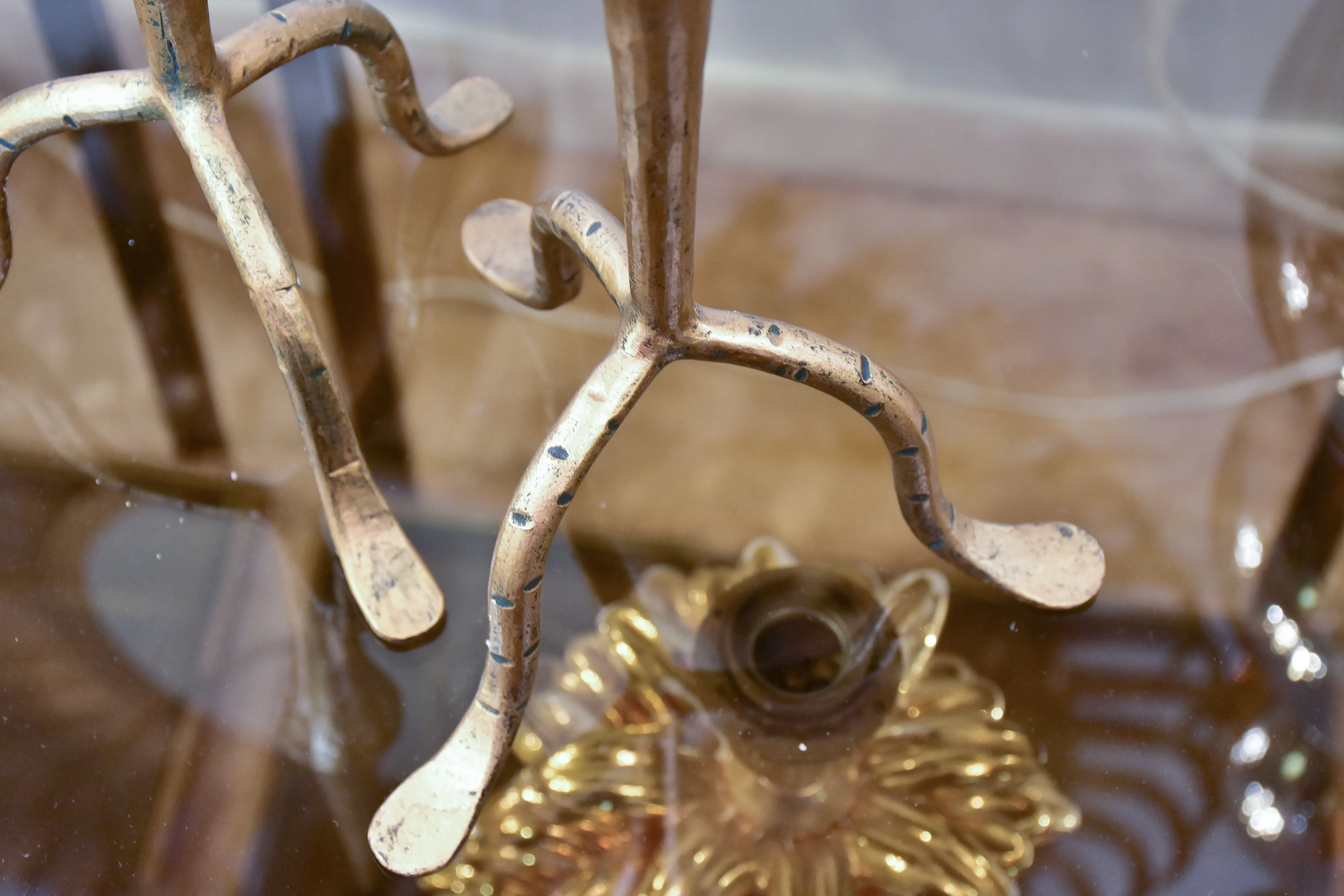 Pair of vintage gold candlesticks with a tripod stand