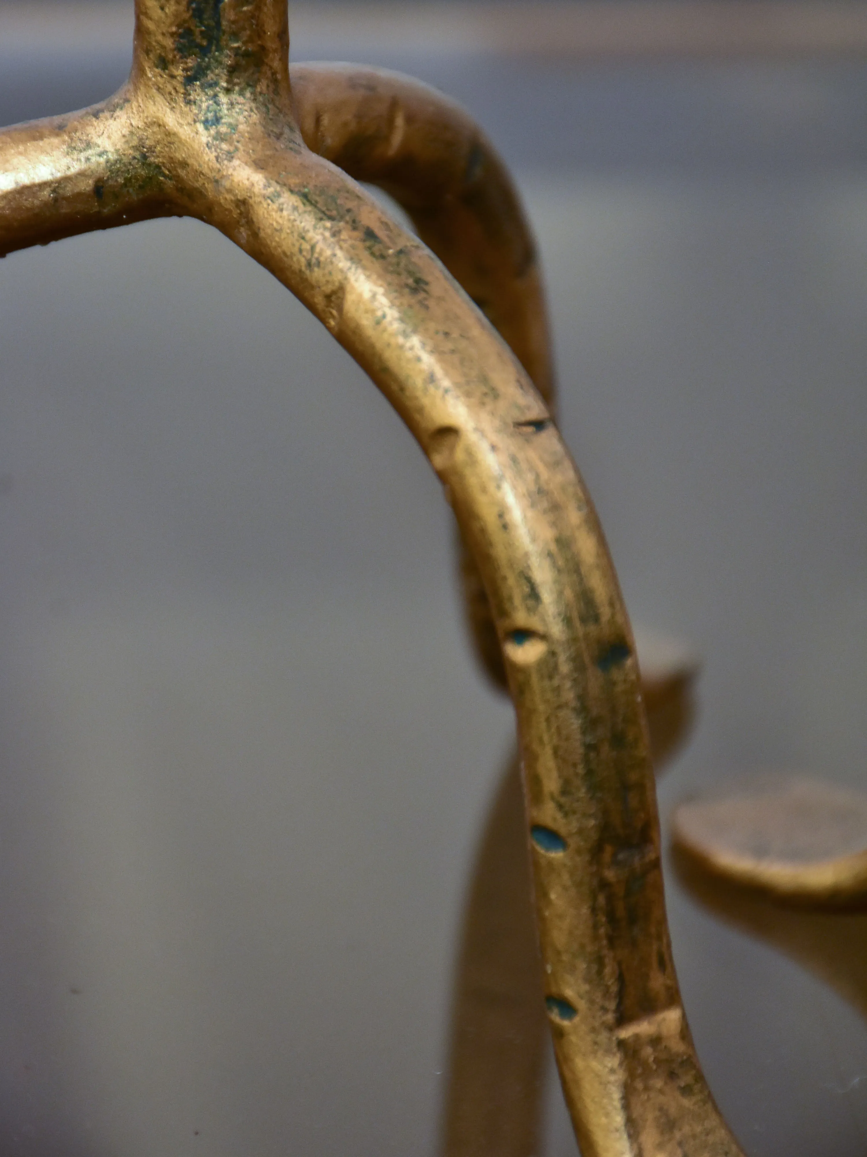 Pair of vintage gold candlesticks with a tripod stand