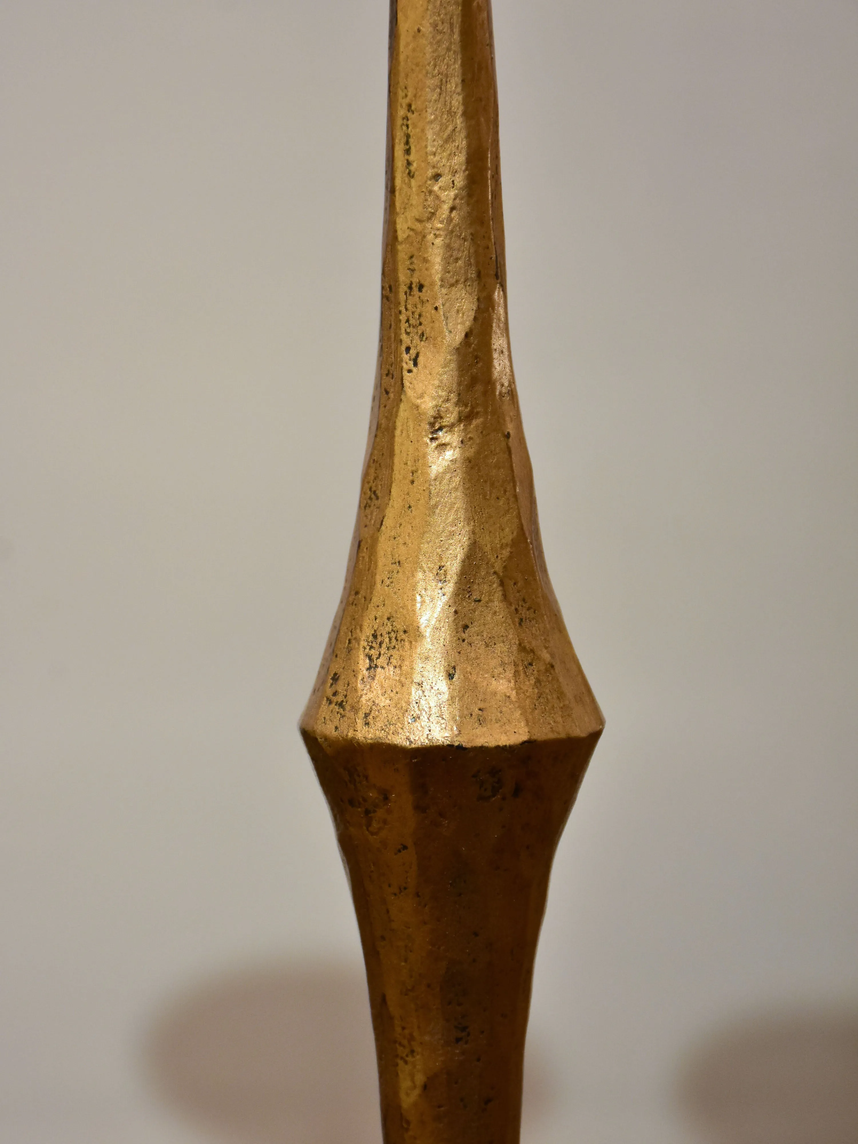 Pair of vintage gold candlesticks with a tripod stand