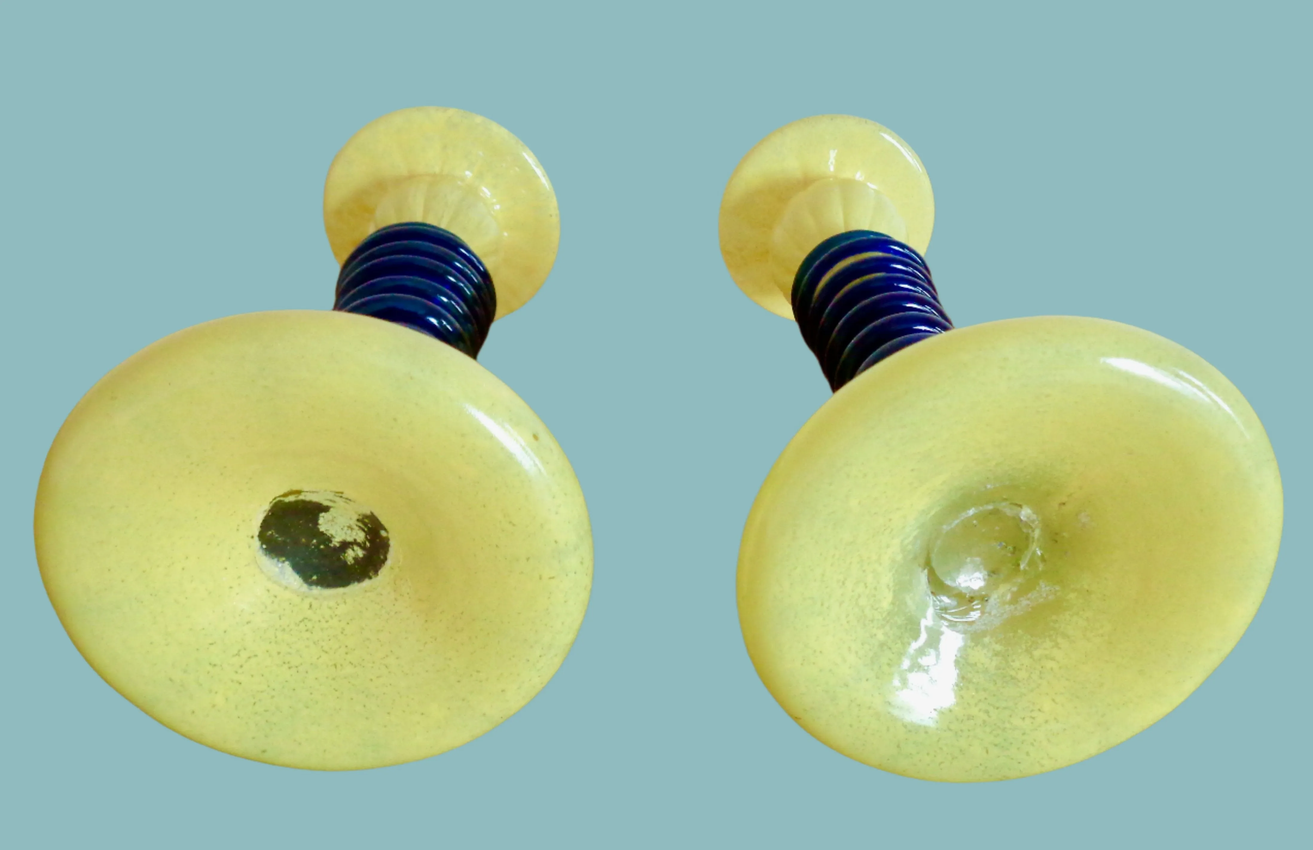 Pair Of Yellow Art Glass Candlesticks With Blue Spiral Glass And Flower Accents