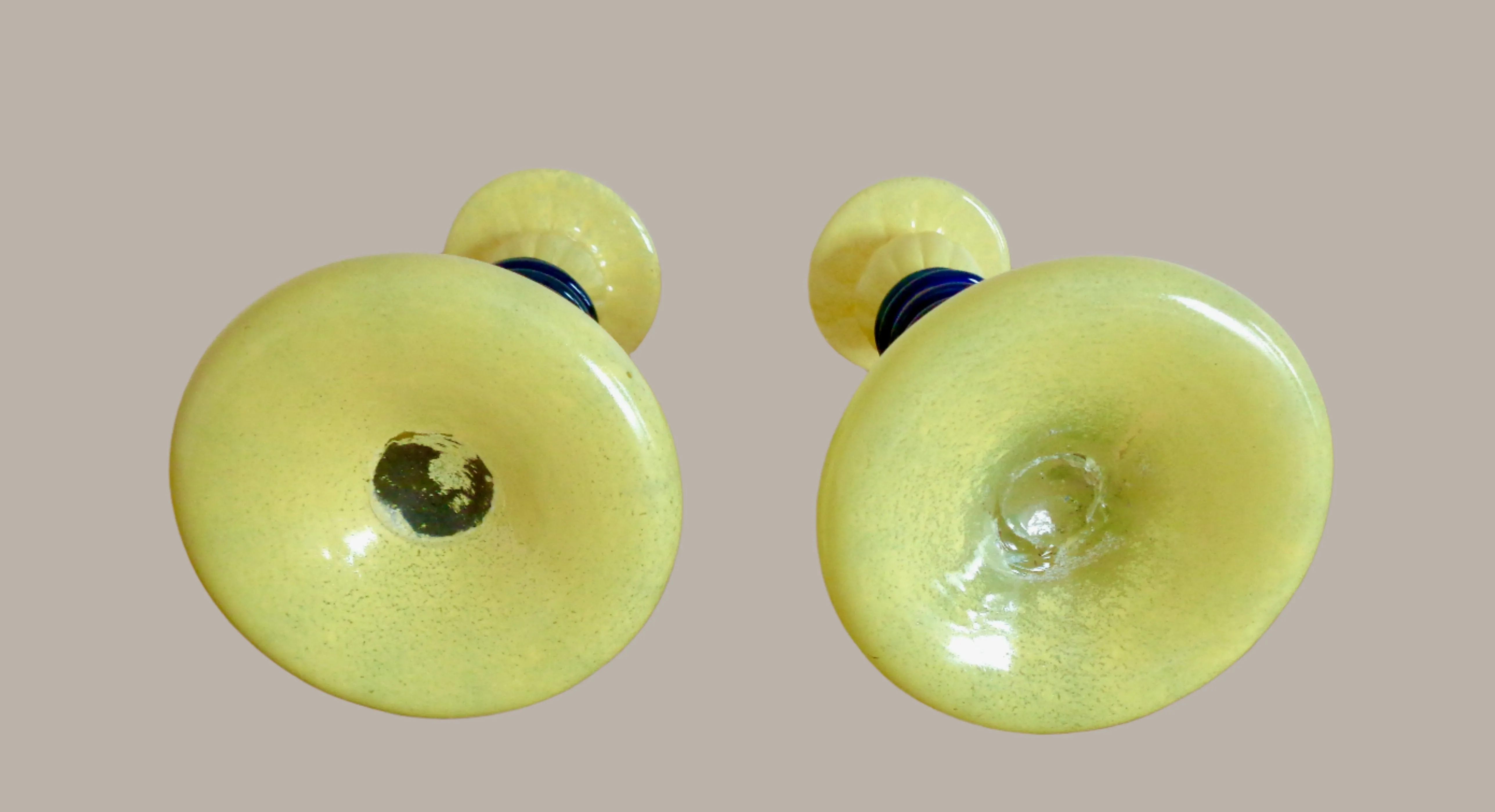 Pair Of Yellow Art Glass Candlesticks With Blue Spiral Glass And Flower Accents