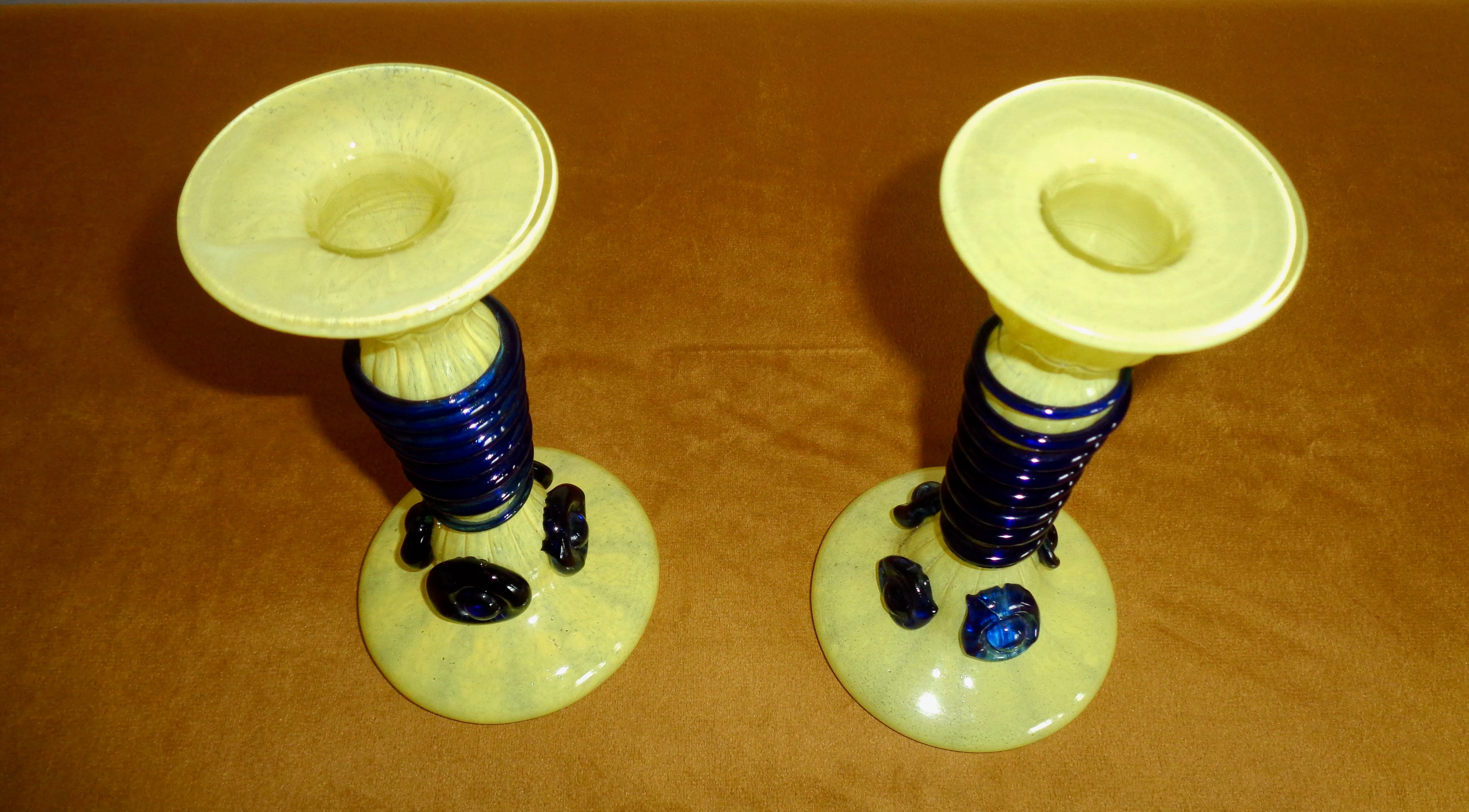 Pair Of Yellow Art Glass Candlesticks With Blue Spiral Glass And Flower Accents