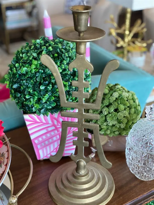 Vintage Brass candle holder with an Asian motif