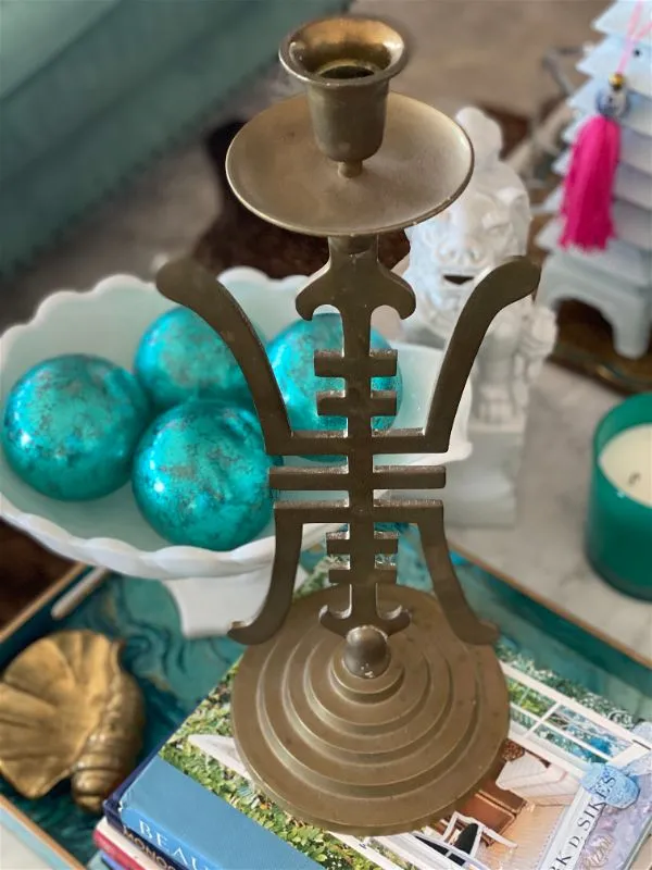 Vintage Brass candle holder with an Asian motif