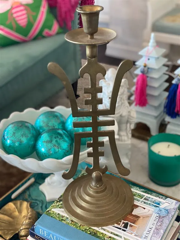 Vintage Brass candle holder with an Asian motif