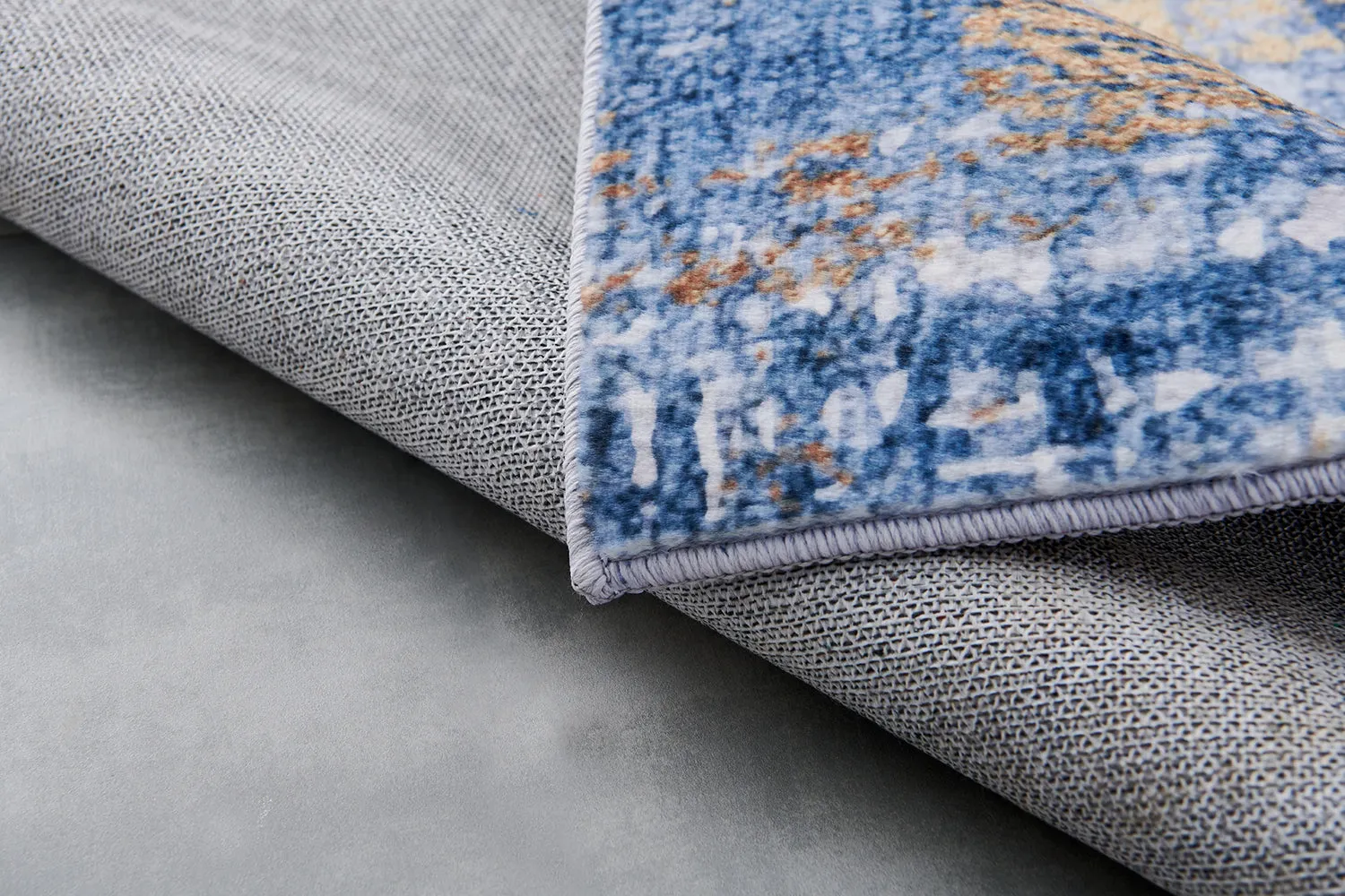 Zara Abstract Design Machine Washable Blue and Gold Area Rug