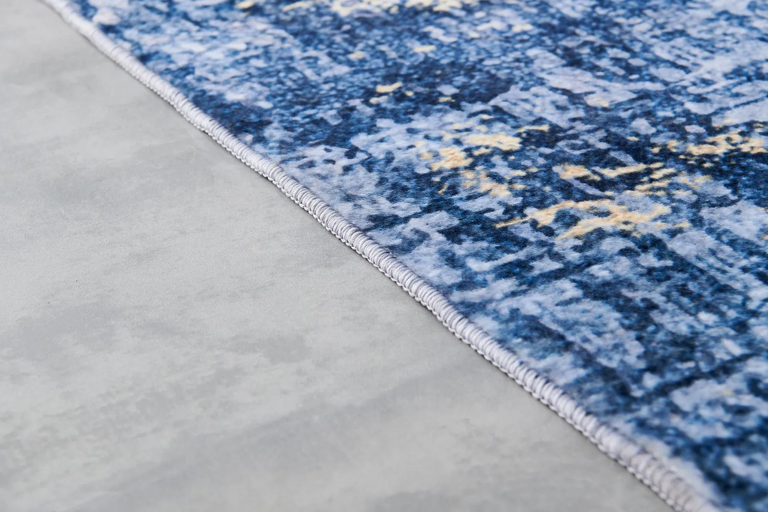 Zara Abstract Design Machine Washable Blue and Gold Area Rug