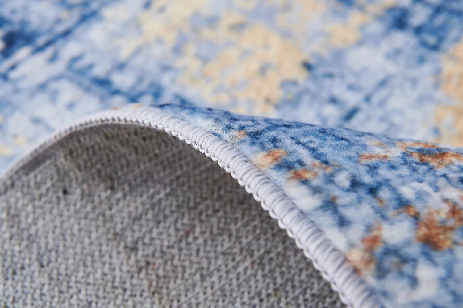 Zara Abstract Design Machine Washable Blue and Gold Area Rug